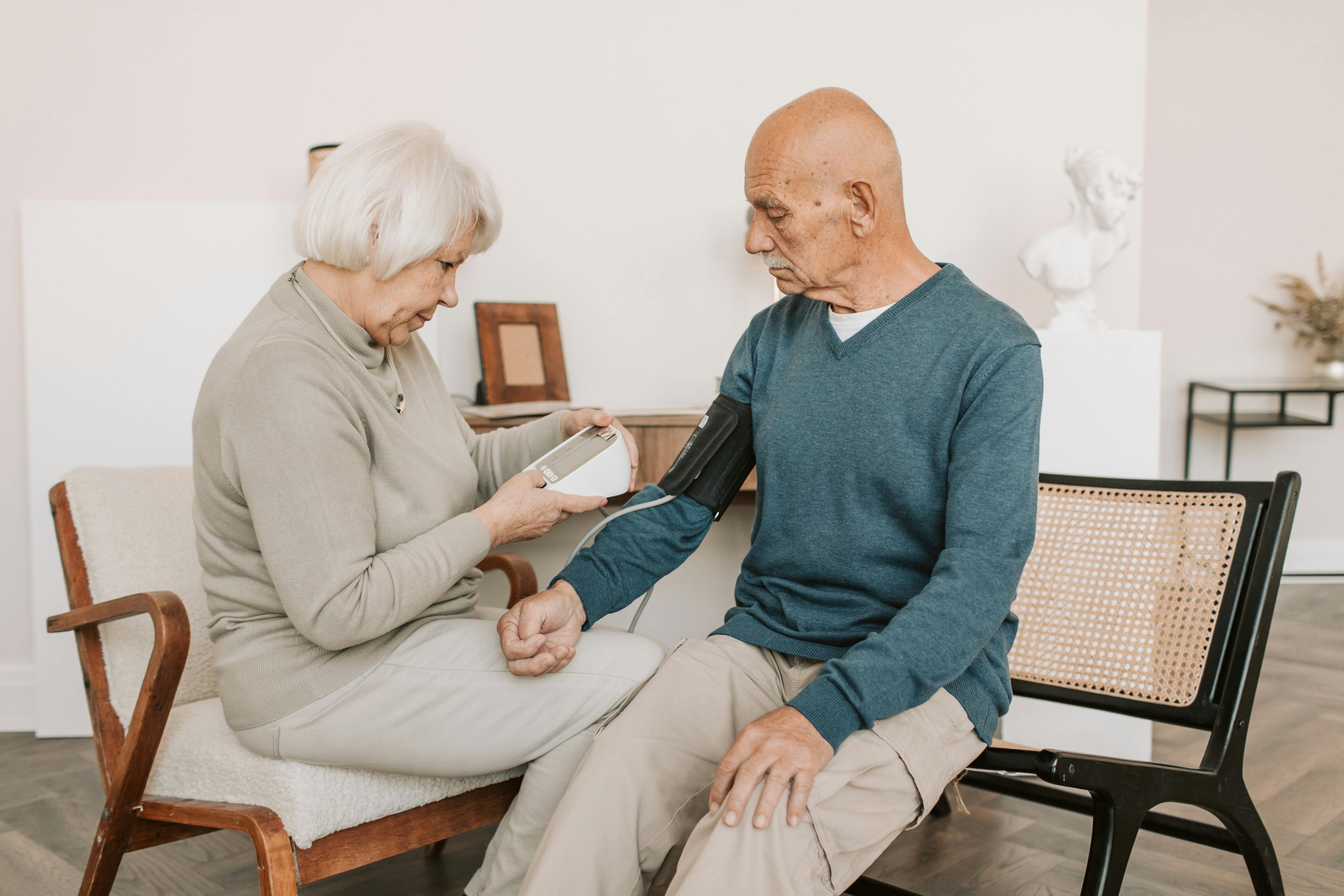 man sitting with caregiver